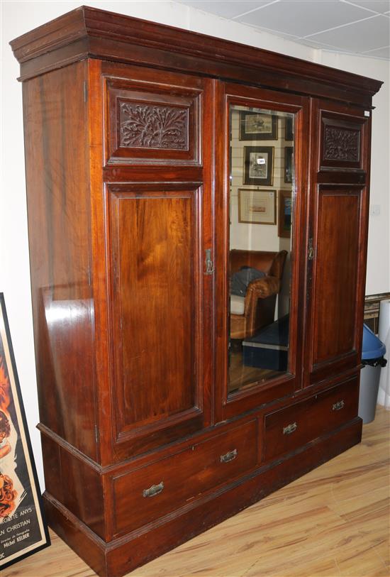 An Edwardian walnut three door wardrobe, W.183cm